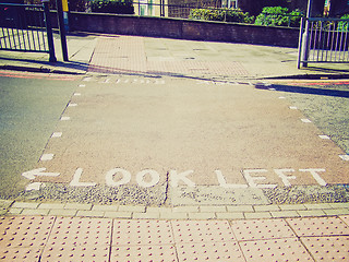 Image showing Retro look Look right look left sign on London zebra crossing