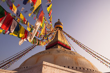 Image showing Prayer flags and Boudhanath stupa in Kathmandu