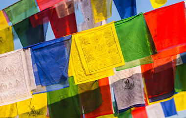 Image showing Colorful buddhist Prayer flags and blue sky