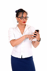 Image showing Business women texting.