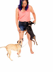 Image showing Woman loving her dog's.