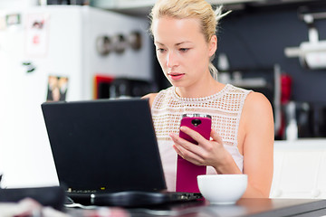 Image showing Business woman working from home.