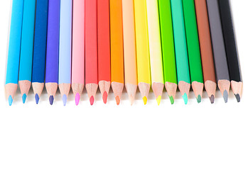 Image showing Colored pencils on row