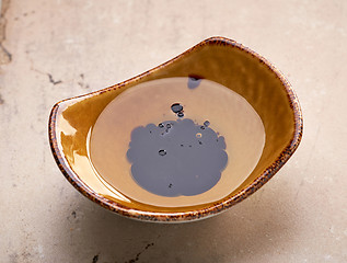 Image showing Bowl of oil and balsamic vinegar