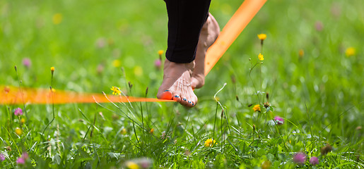 Image showing Slack line in the city park.