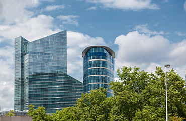 Image showing Modern building near park with green trees