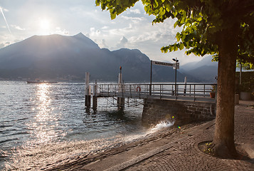 Image showing View of Como lake on sunset with pier in Italy