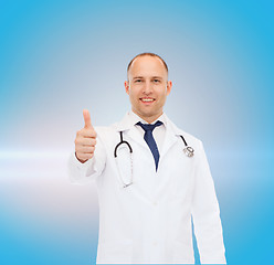 Image showing smiling doctor with stethoscope showing thumbs up