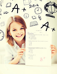 Image showing girl with test and A grade at school