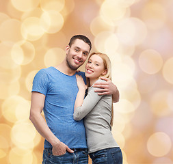 Image showing smiling couple hugging