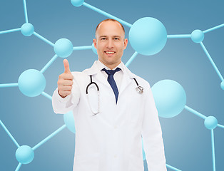 Image showing smiling doctor with stethoscope showing thumbs up