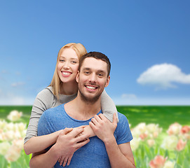 Image showing smiling couple hugging