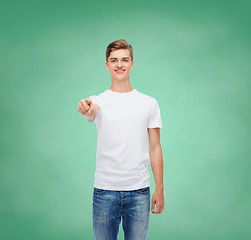 Image showing smiling young man in blank white t-shirt