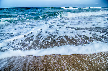 Image showing seascape with waves and sand beach