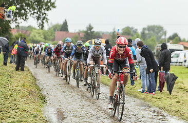 Image showing The Cyclist Lars Bak on a Cobbled Road - Tour de France 2014