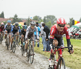 Image showing The Cyclist Romain Bardet on a Cobbled Road - Tour de France 201