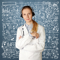 Image showing doctor woman with headphones smile at camera