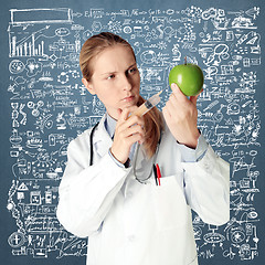 Image showing scientist woman with apple