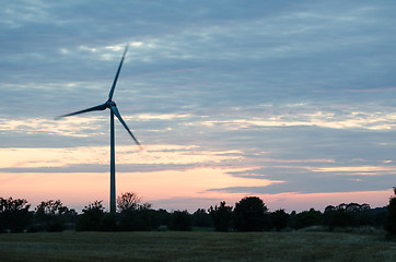 Image showing Wind turbine at late evening