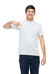 Image showing smiling young man in blank white t-shirt