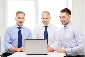 Image showing business team working with laptop in office