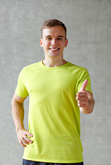 Image showing smiling man in gym