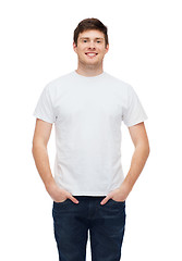 Image showing smiling young man in blank white t-shirt