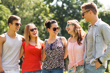 Image showing group of smiling friends outdoors