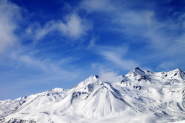 Image showing Winter snowy mountains at windy day