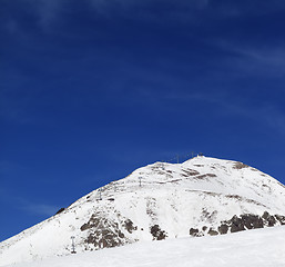 Image showing Winter mountains and ski slope