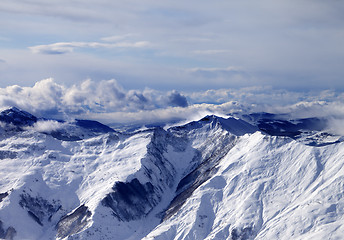 Image showing Winter mountains in mist at windy day