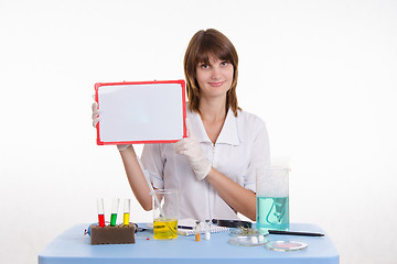 Image showing Teacher holding plate