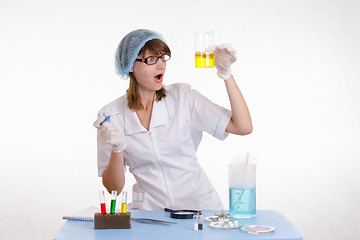 Image showing Pharmacist surprised by the results