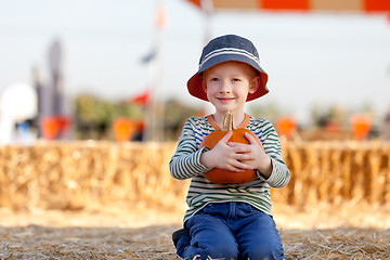 Image showing kid at pumpkin patch