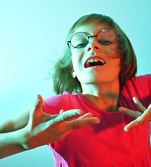 Image showing adorable cute child lit with color light