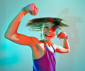 Image showing child exercising with dumbells