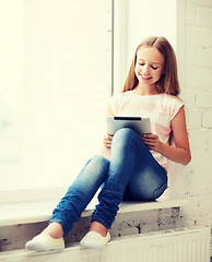 Image showing girl with tablet pc at school