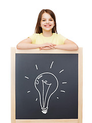 Image showing happy little girl with blackboard