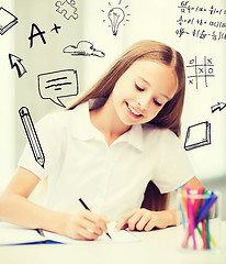 Image showing little student girl drawing at school