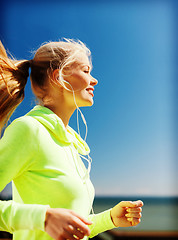 Image showing woman doing running outdoors