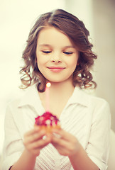 Image showing girl with cupcake