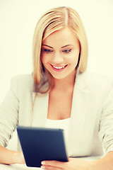 Image showing smiling student girl with tablet pc