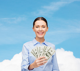 Image showing businesswoman with dollar cash money