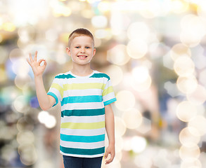 Image showing little boy in casual clothes making OK gesture