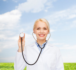 Image showing smiling female doctor with stethoscope