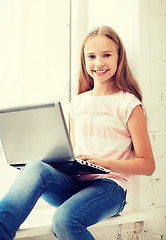 Image showing girl with laptop pc at school