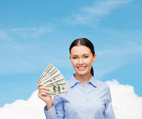 Image showing businesswoman with dollar cash money