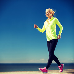 Image showing woman walking outdoors