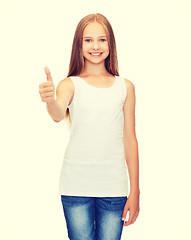 Image showing girl in blank white shirt showing thumbs up