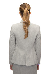 Image showing businesswoman or teacher in suit from back